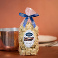 Bolsa de Ravioli alla Carne Alfieri 500g con lazo azul, pasta seca rellena artesanal del Piamonte italiano.